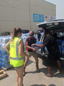 Church members unloading water at CFA Bunyip